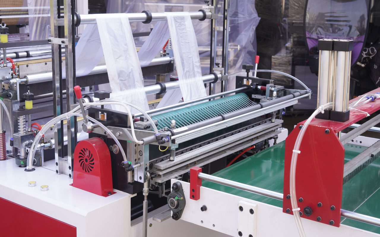 Double-Layer 4-Line Heat-Seal Cold-Cut Machine W/ Conveyor