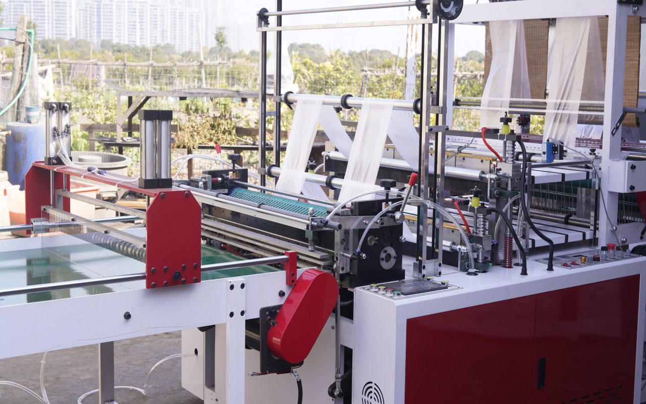 Double-Layer 4-Line Heat-Seal Cold-Cut Machine W/ Conveyor